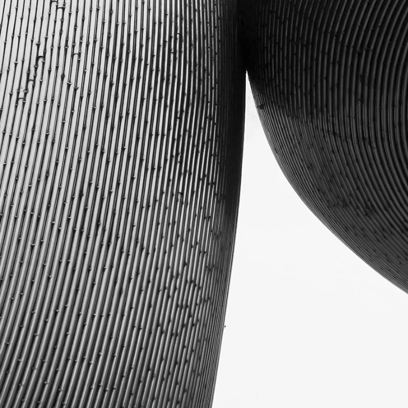 Close-up of striped fabric texture in black and white.